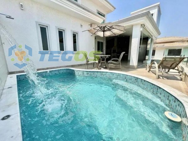 Casa localizado em Paquetá. 4 quartos, 5 banheiros e 4 vagas. Foto 2