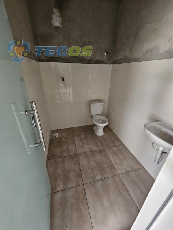 Galpão localizado em Jardim Alterosa com área útil 309.00 m². Foto 6